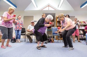 seniors in aged care dancing