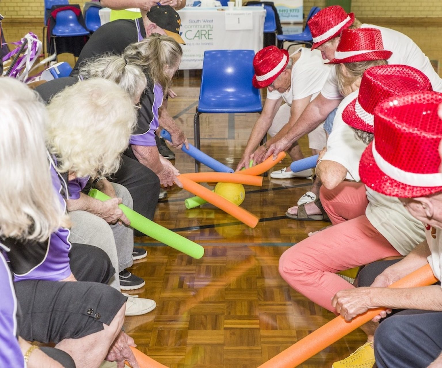 pool-noodle-hockey-exercise-for-seniors