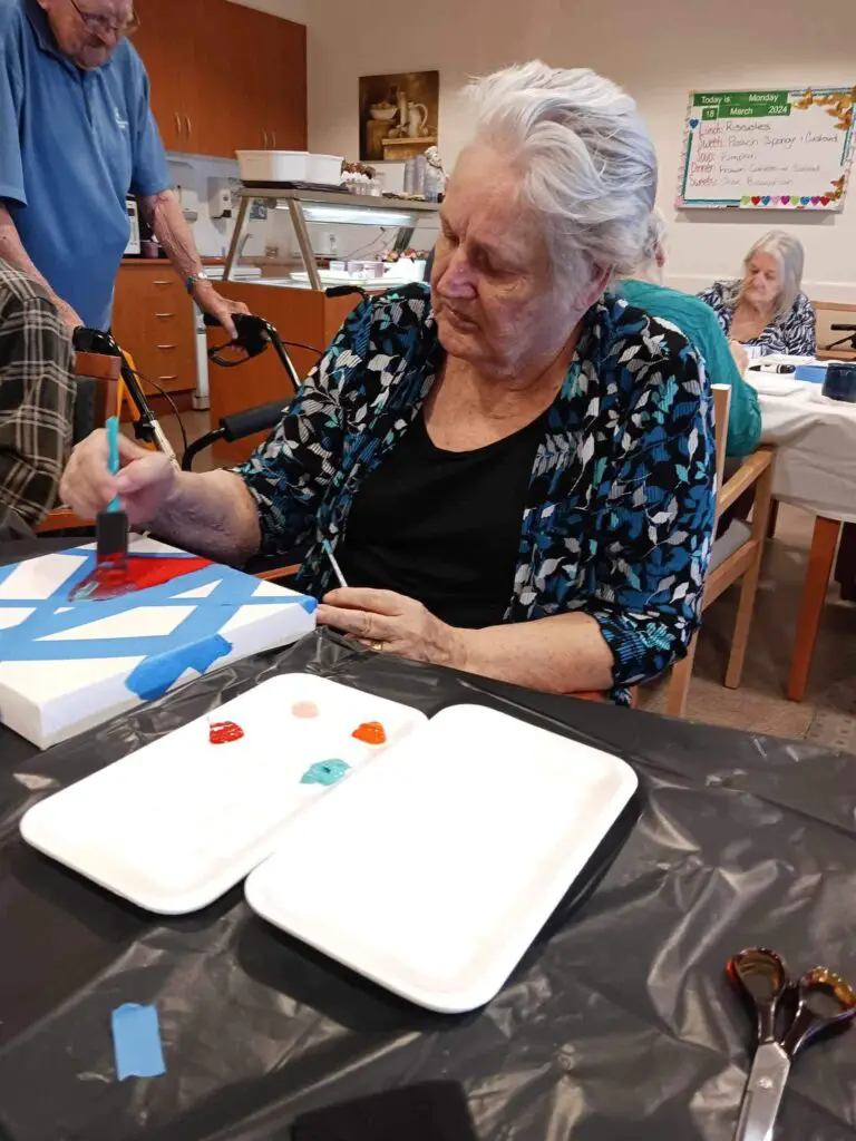 elderly lady painting